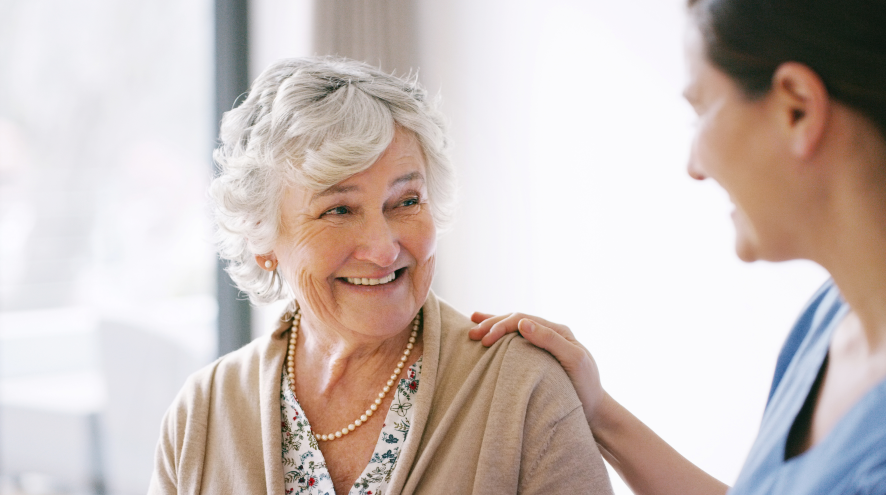 Smiling senior woman at her doctor's office.