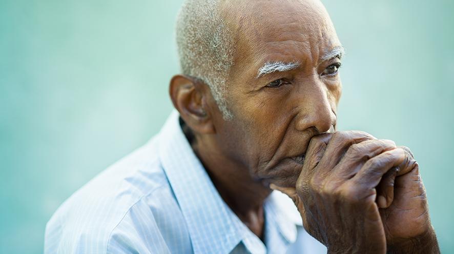 Senior man in deep thought.